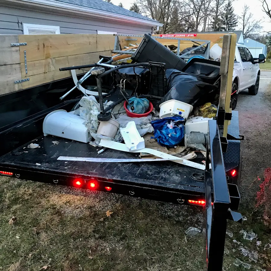 Roll-off dumpster delivered to a residential driveway in Lehigh